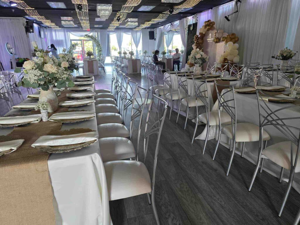 Gold and white table decor at OC Salsa Venue & Banquet Hall in Fountain Valley