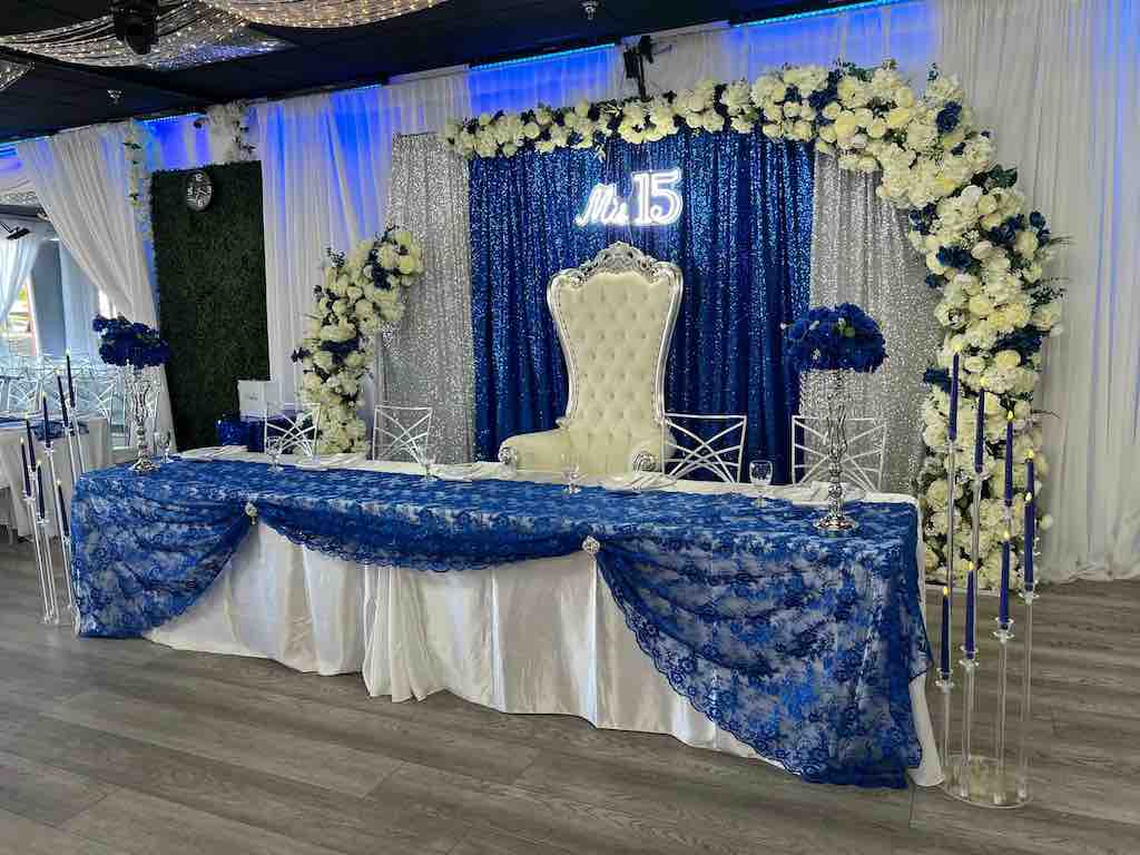 Main table blue & silver theme Main table black and gold at OC Salsa Venue in Fountain Valley