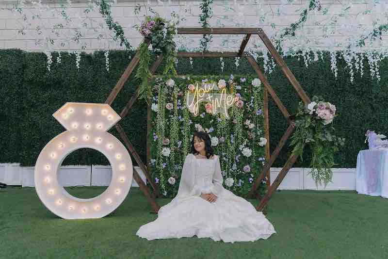 Bride celebrating in the private garden at OC Salsa Venue