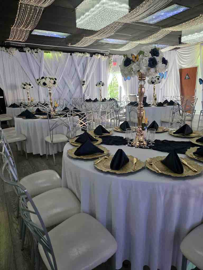 Tables and chairs set up for guests at OC Salsa Venue