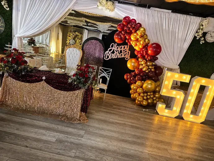 Elegant 50th birthday ballroom setup