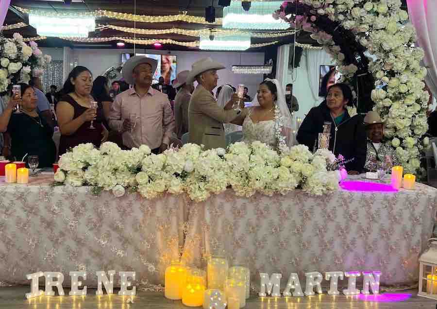 Family celebrating with newlyweds at OC Salsa Venue