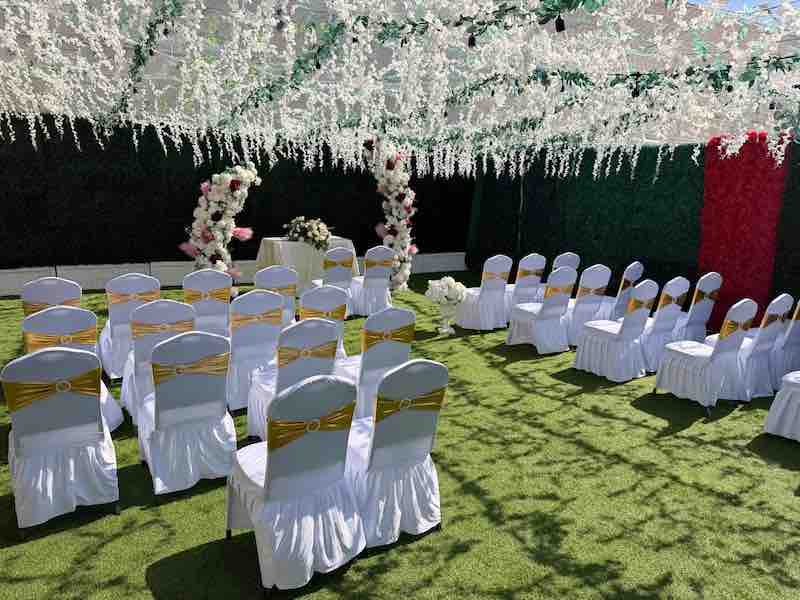 Garden prepared for a wedding ceremony at OC Salsa Venue
